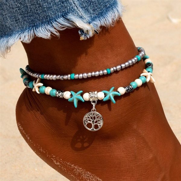Bracelet cheville style plage avec perles et pendentif en métal