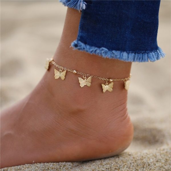 Bracelet cheville en chaîne couleur or avec papillons