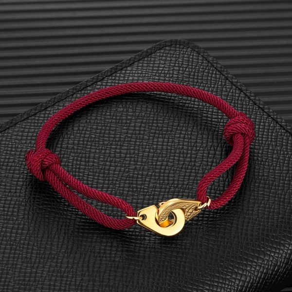 Bracelet menotte en corde avec détail dorés et noeud coulissant
