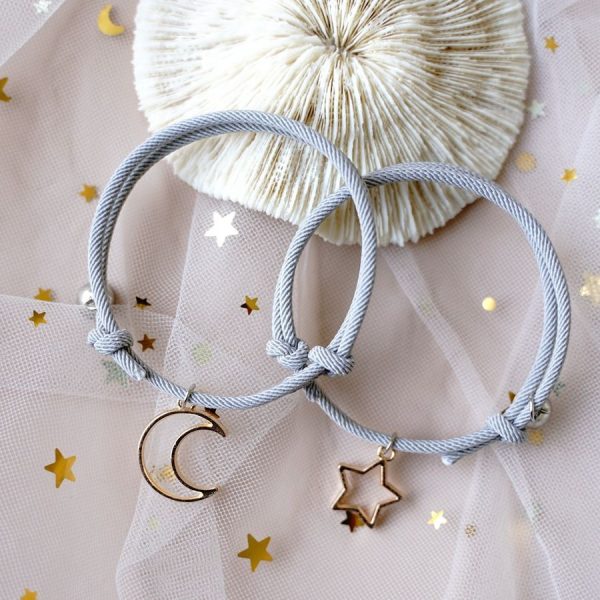 Bracelet amitié magnétique cordon ajustable pendentif lune et étoile