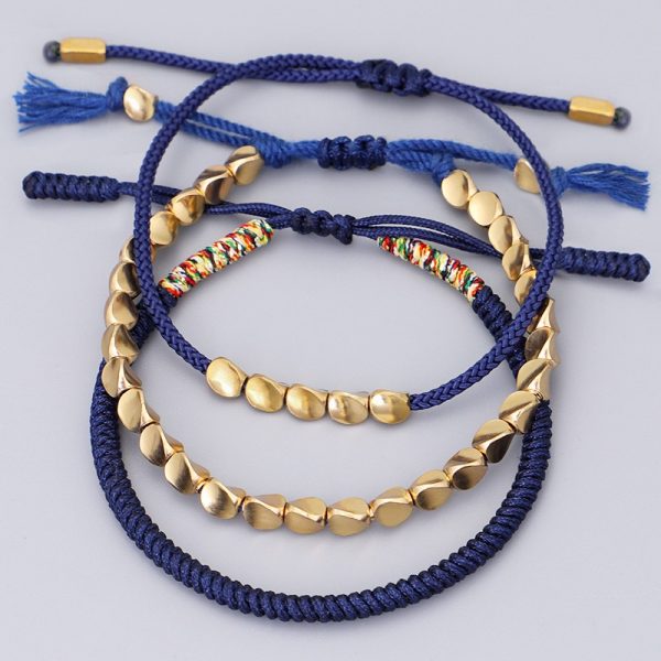 Bracelet triple bouddhiste tibétain tressé avec des perles en cuivre