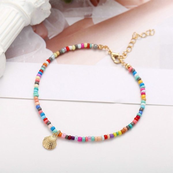 Bracelet de cheville perles multicolores et pendentif coquillage