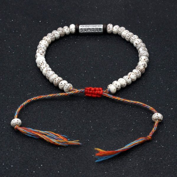 Bracelet bouddhiste en perles bodhi naturelles et amulette sculptée