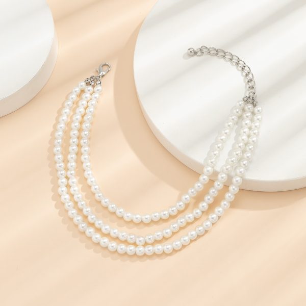 Bracelet cheville en perles blanches