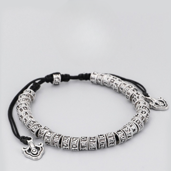 Bracelet bouddhiste cordon ajustable et perles en métal